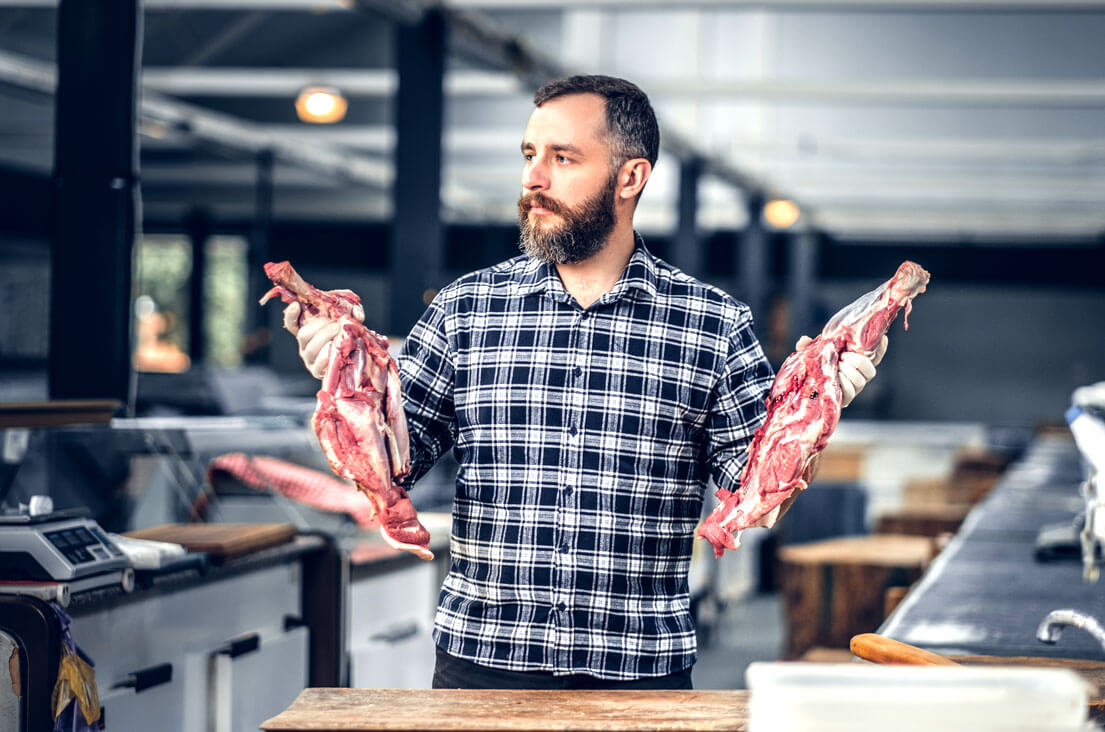 Butcher Holding Meat Butcher Holding Meat